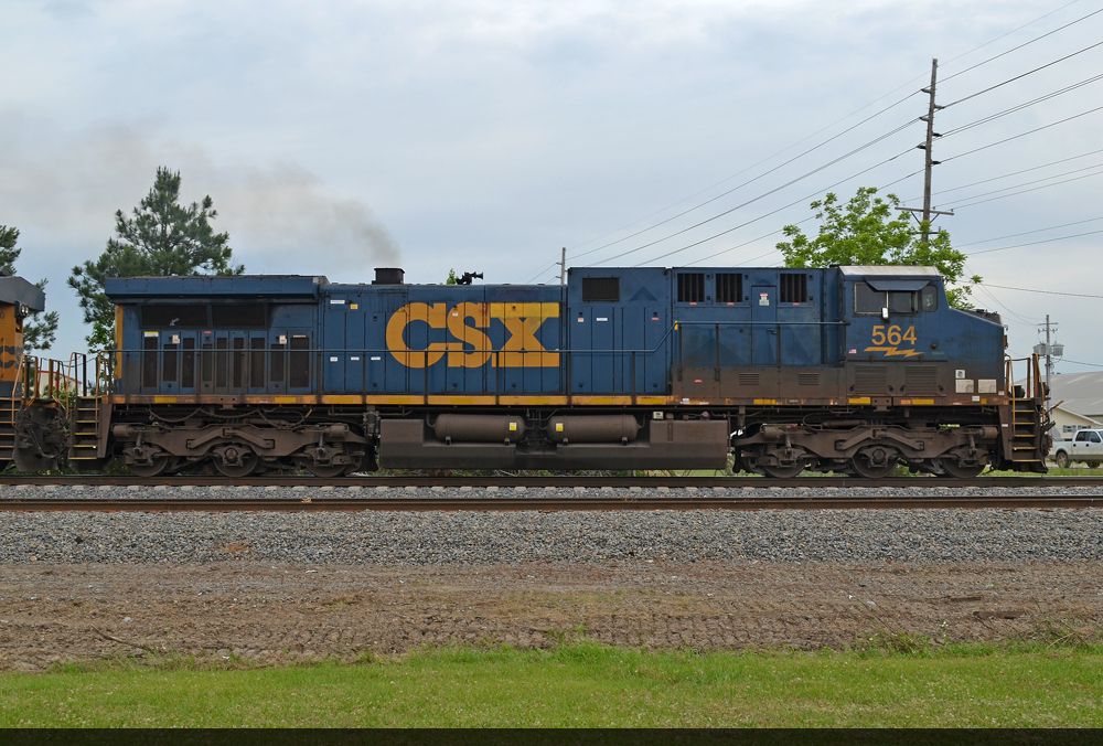 CSX 564 has a broken horn, 1 bell dangling